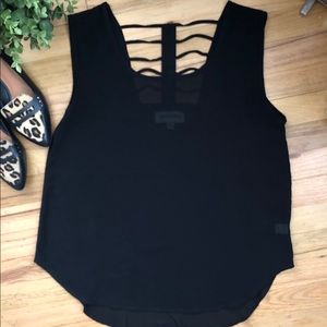 Sleeveless blouse with back cutout detailing